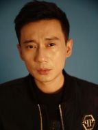 譚史明（徐洪浩飾演）