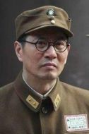 賀國光