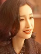 李萍（秦海璐飾演）