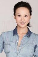 練束梅